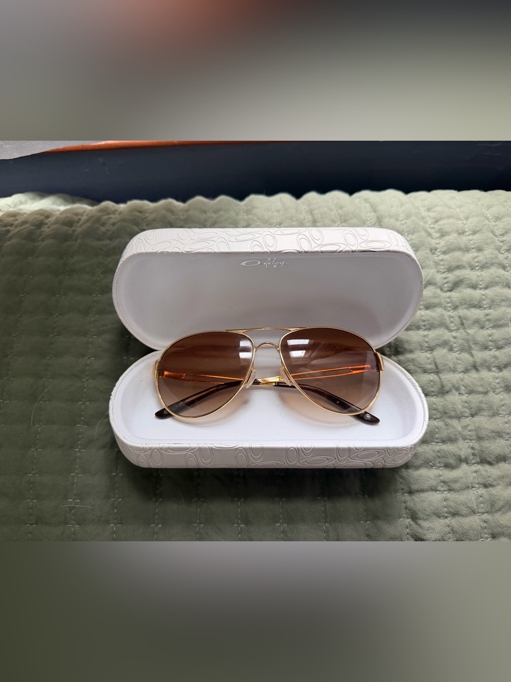 Oakley Gold Frame Sunglasses with Brown Lenses